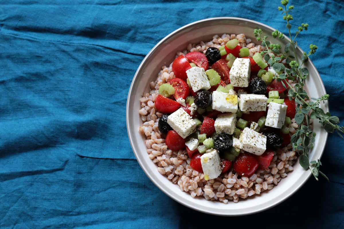 spelled salad, cherry tomatoes and feta