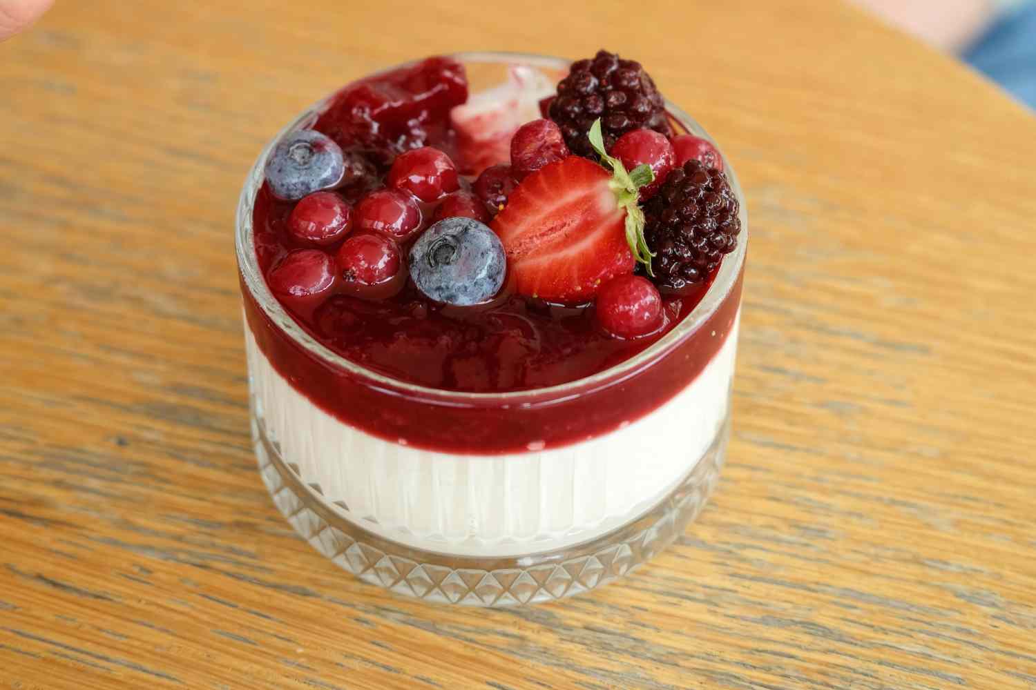 Greek yogurt cups with honey and red fruits