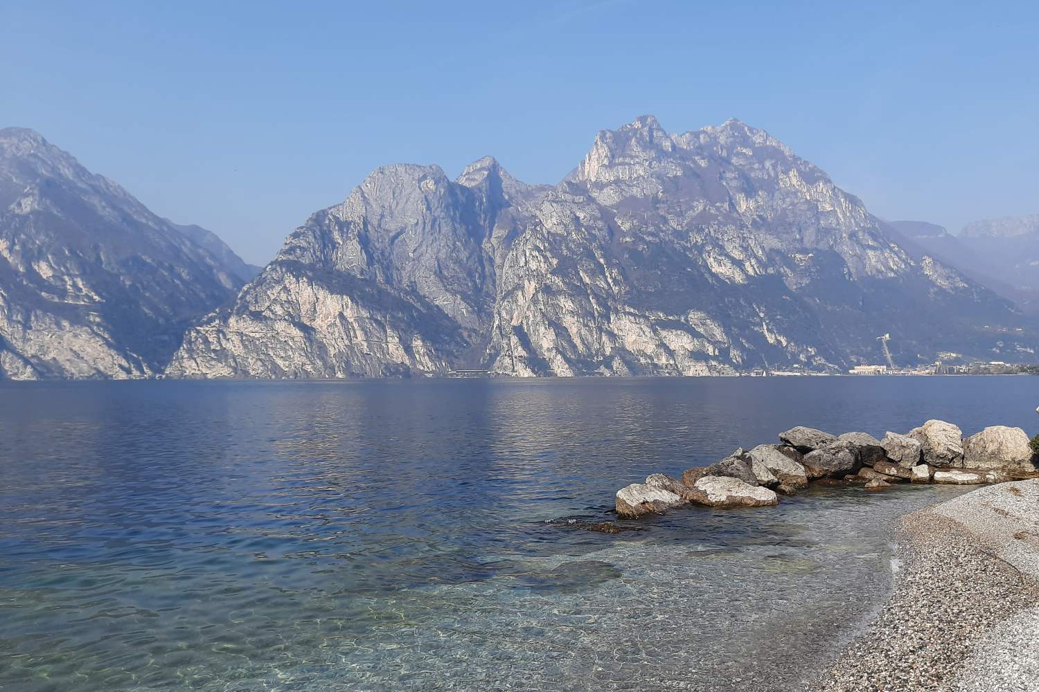 Lake Garda: I'll take you to discover the Trentino shore where the mountains plunge into the water and the villages seem suspended in the wind