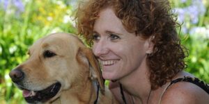 Blind since the age of 11, she regained her sight by banging her head on a table (while giving her guide dog a kiss)