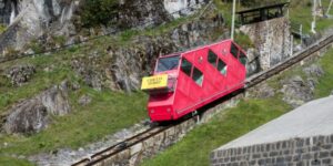 This funicular is among the steepest in the world and takes you to a Caribbean-colored lake in 12 minutes