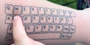 Mother tattoos a Qwerty keyboard on her arm to communicate with her autistic son: the brilliant idea that thrilled the world