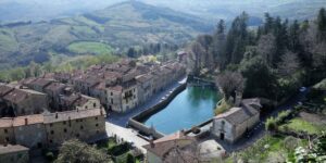 In this Tuscan village you can walk over a water source (and discover an ancient legend)